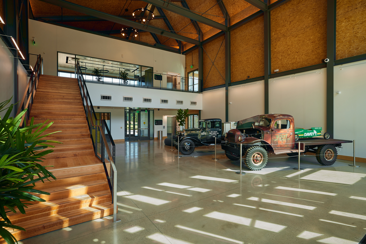 SEED Campus lobby with restored vehicles